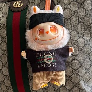 Labubu Fall in Wild Keychain with Black and Tan Outfit